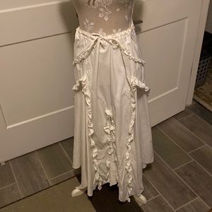 COPY - Cream colored with ruffles.  In a size 12.